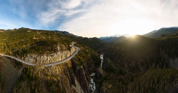 Aerial drone view of Sea to Sky Highway during a bright winter sunset — Stock Photo, Image