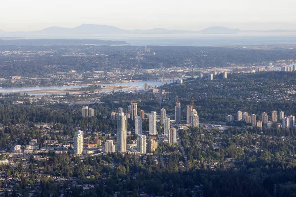 Aerial View from Airplane of Residential Homes and Buildings in a modern city — Stock Photo, Image