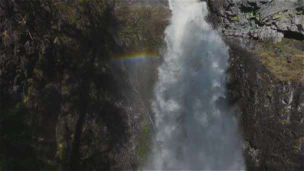 Waterfall rushing down a rocky canyon in the Canadian Mountains. — Stock Video