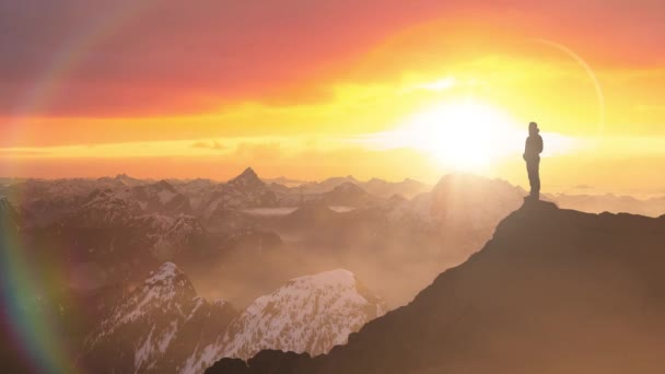 Magical Fantasy Adventure Composite of Man Hiking on top of a rocky mountain — Stock Video