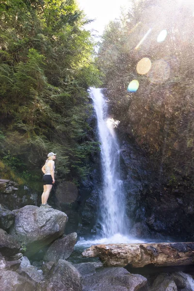 Adult Woman hiker at Norvan Falls and river stream in the natural canyon — Stock Photo, Image