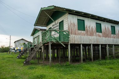 wooden buildings in sustainable development reserve  clipart