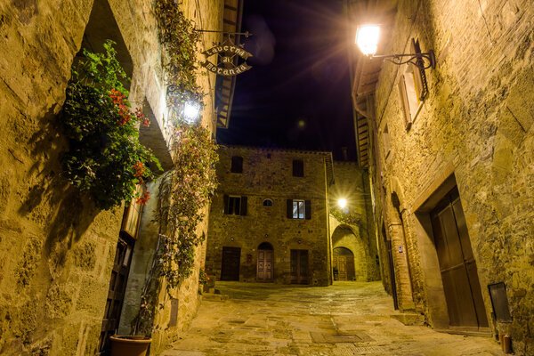 Night view of beautiful antique architecture of Monticchiello, Tuscany, Italy