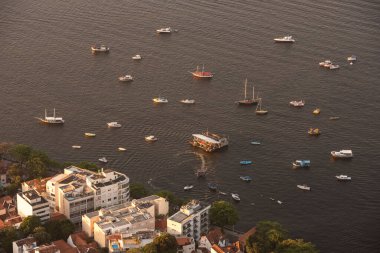Beautiful view from above from Sugar Loaf mountain to buildings and boats in Urca, Rio de Janeiro, Brazil