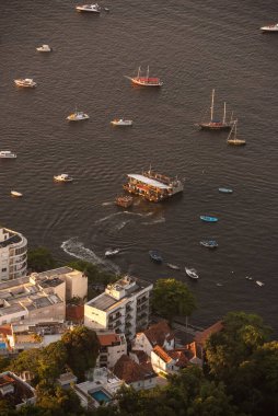 Beautiful view from above from Sugar Loaf mountain to buildings and boats in Urca, Rio de Janeiro, Brazil