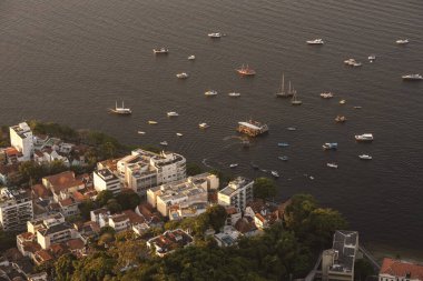 Beautiful view from above from Sugar Loaf mountain to buildings and boats in Urca, Rio de Janeiro, Brazil