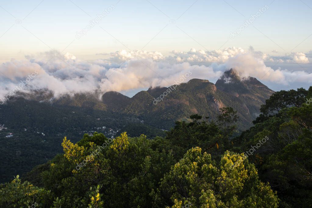 Beautiful view to green rainforest mountains and clouds in Tijuca Park, Rio de Janeiro, Brazil