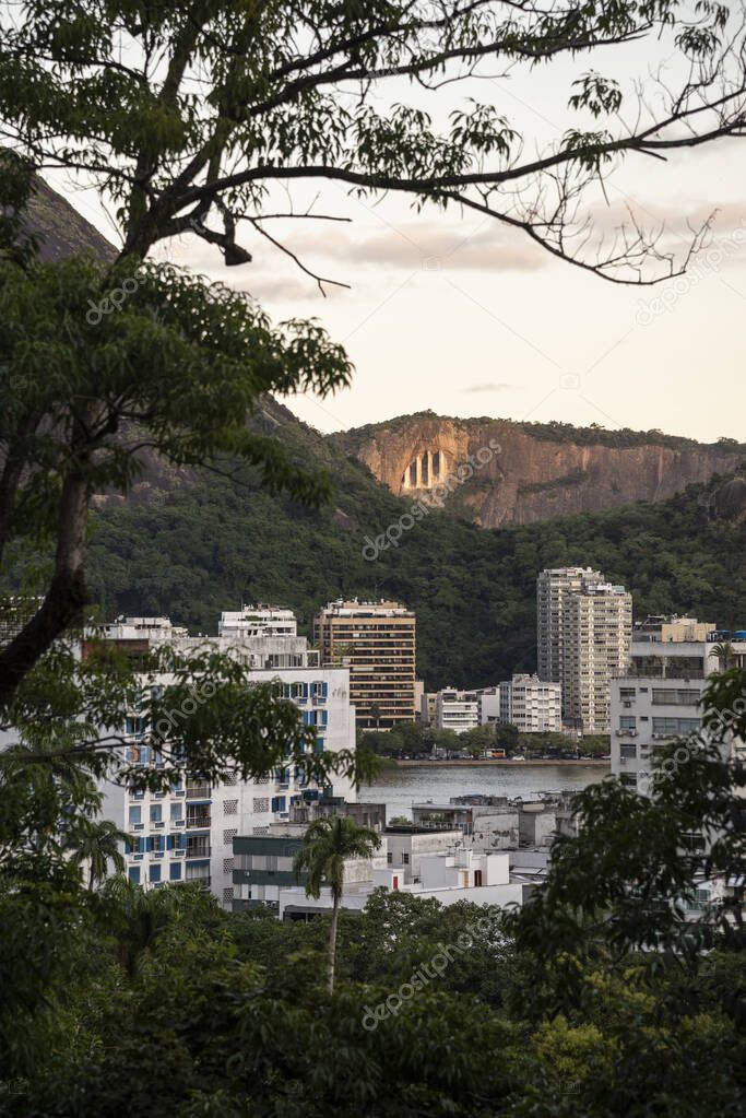 Beautiful view to lagoon, city, mountains and green rainforest landscape, Rio de Janeiro, Brazil