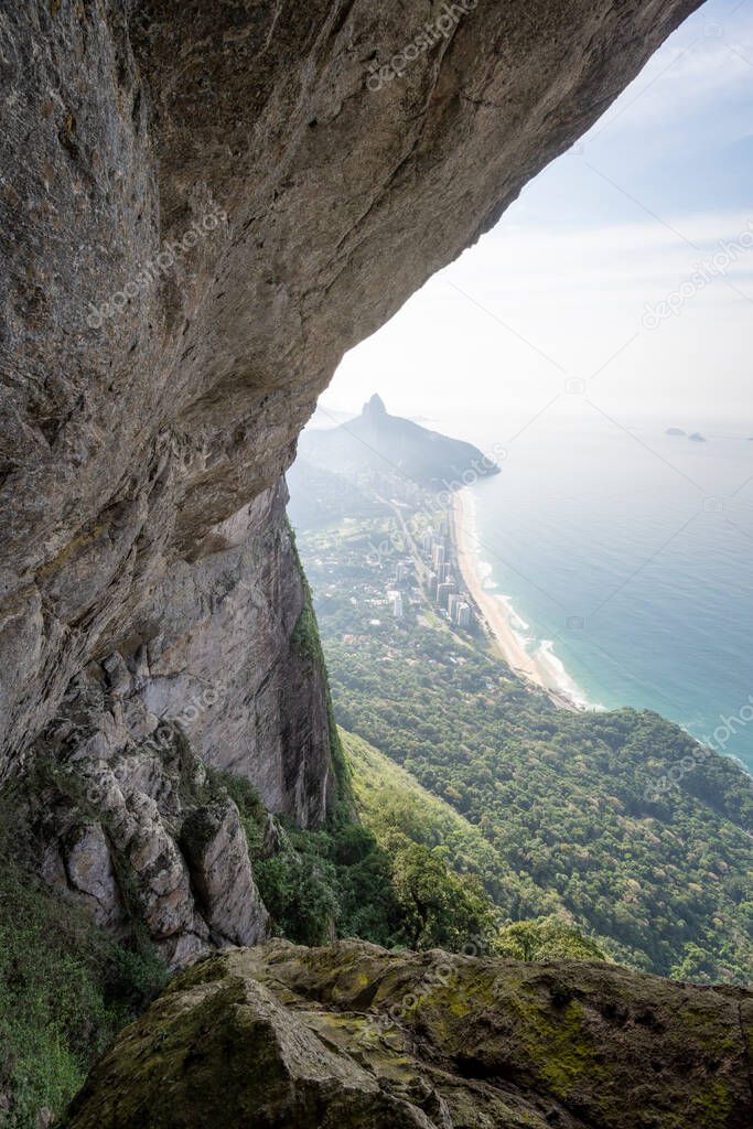 Beautiful mountani rainforest landscape seen from rocky cave, Rio de Janeiro, Brazil