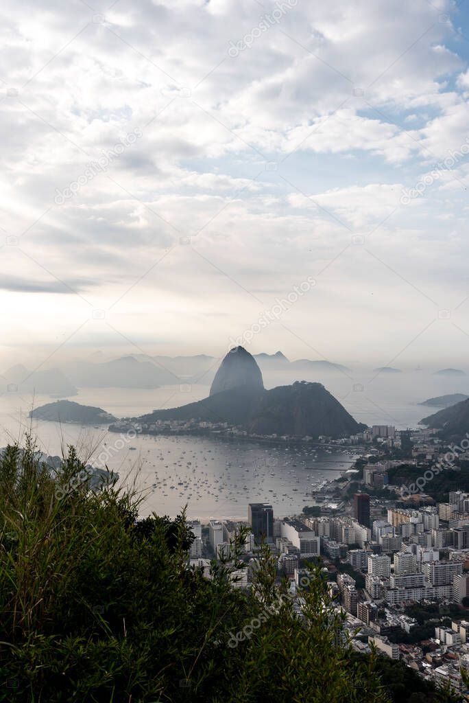 View to city, ocean and Sugar Loaf Mountain in Rio de Janeiro, Brazil