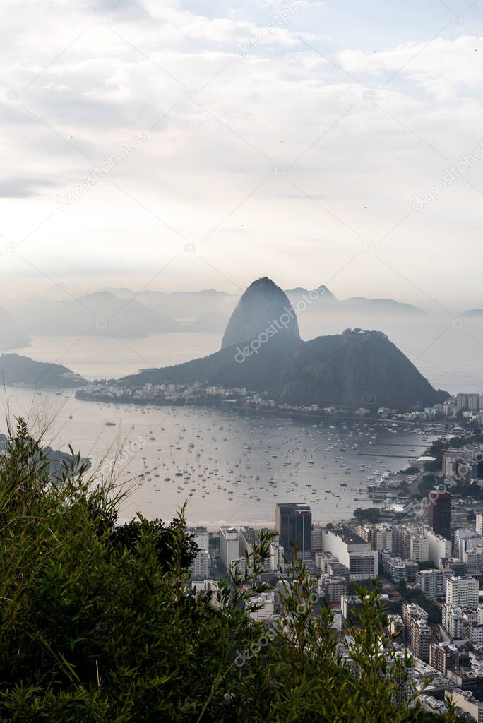 View to city, ocean and Sugar Loaf Mountain in Rio de Janeiro, Brazil