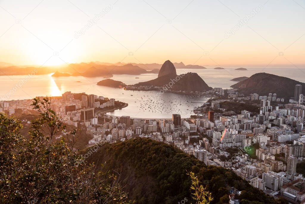 Beautiful sunrise view to city, ocean and Sugar Loaf mountain in Rio de Janeiro, Brazil