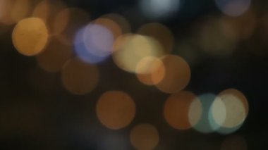 Arka plan bokeh kasabası. Kusursuz 4K. Gece Bokeh arka plan şehir kavramı.