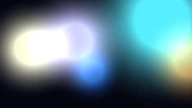 Siyah arkaplanda bulanık renkli ışık.