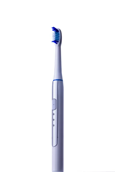 Escova de dentes elétrica isolada no fundo branco positi vertical — Fotografia de Stock