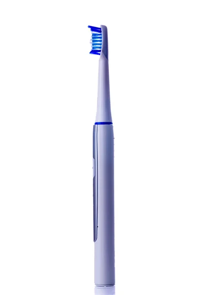 Electric toothbrush isolated on white background vertical positi — Stock Photo, Image