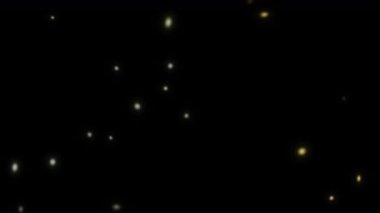 Alfa kanal animasyonlu çok renkli bokeh parçacıkları. Süzülen ışık parçacıkları yumuşak parıltı hareket etkisiyle örtüşürler. Yumuşak parlayan parçacık ve bulanık dinamik ışık örtülü parlak küreler