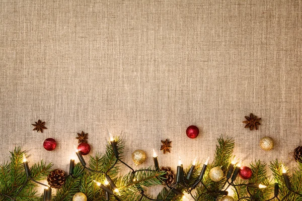 Decorazione di Natale sfondo su tela di lino . — Foto Stock