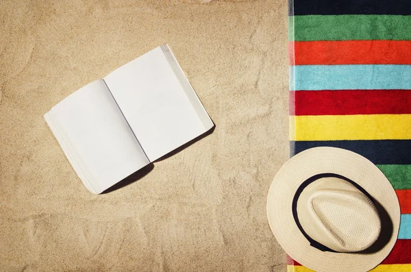 Top view of beach and sand with accessories