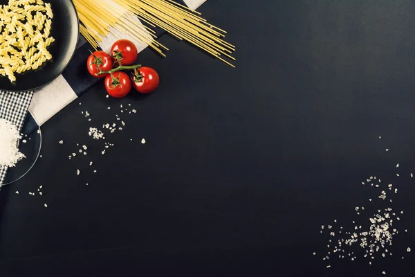 Food preparation background with pasta ingredients. Top view.