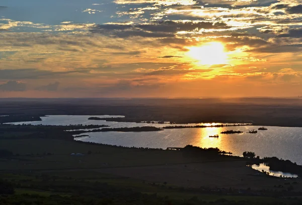 Aerial view on a lake at sunset — Stock Photo, Image