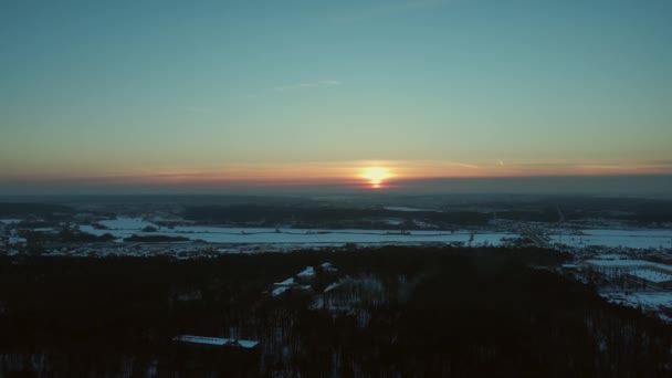 Vista aérea do pôr-do-sol de inverno. — Vídeo de Stock