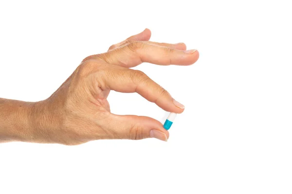 Ženská Ruka Drží Pilulku Izolované Bílém Pozadí — Stock fotografie