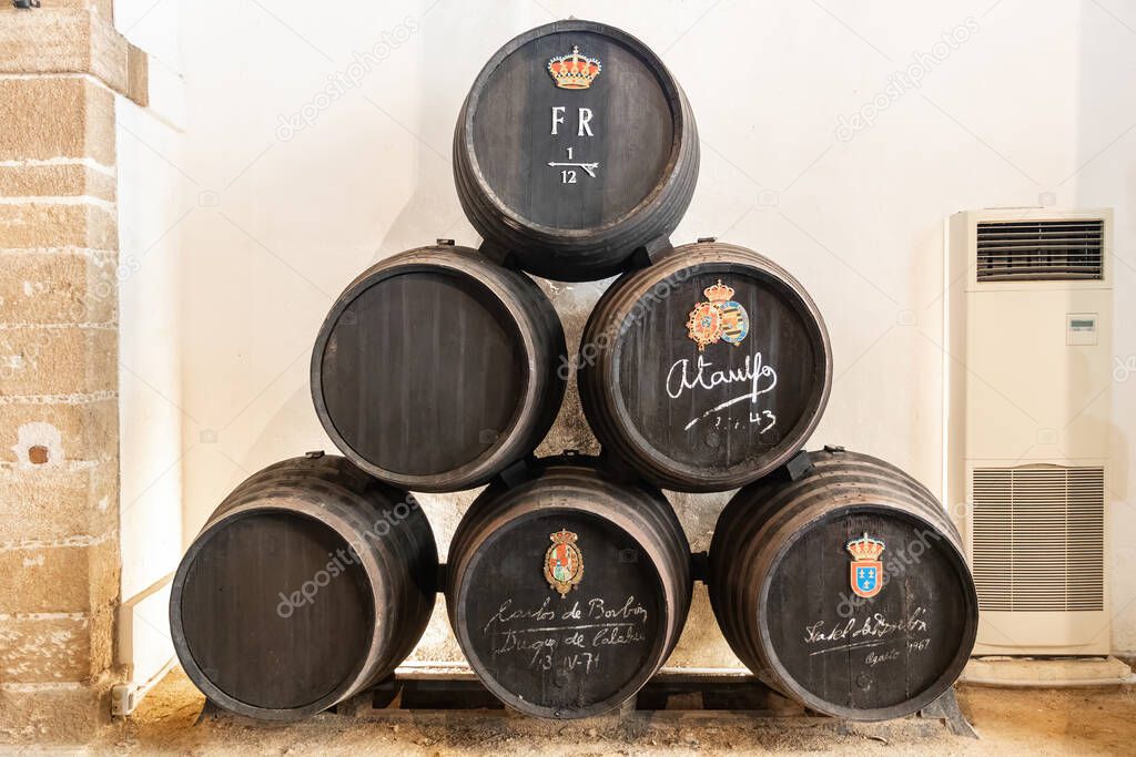 El Puerto de Santa Maria, Cadiz, Spain - June 15, 2021:  Exposure of barrels of Caballero in The San Marcos castle. In Wineries 