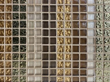 Abstract square pixel mosaic wall background and texture. brown, gold, white glass mosaic tiles. background pattern, testure