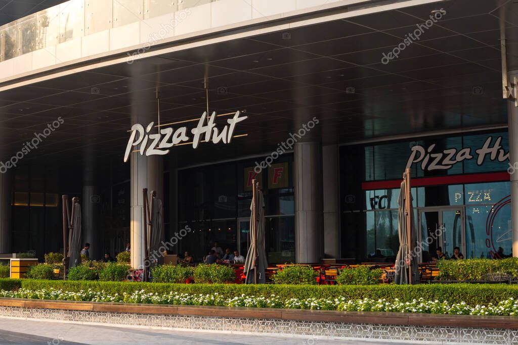 Dubai, UAE - October 3, 2019- Pizza Hut is an American restaurant chain. Italian-American cuisine menu including pizza and pasta, as well as side dishes and desserts