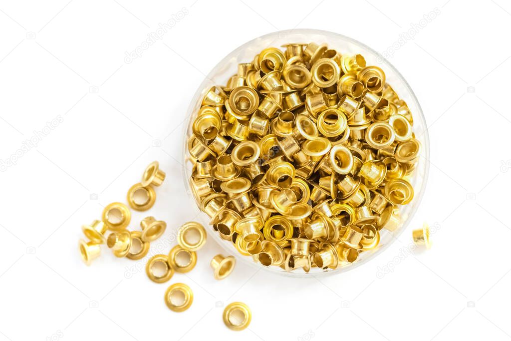Grommets set on white background. Metal, satin brass, steel, gold, copper eyelets. Grommets for canvas, tarpaulins, tents and tag