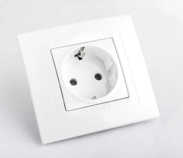Nieuwe Stopcontact Een Witte Tafel Decoratief Element Het Interieur Wit — Stockfoto