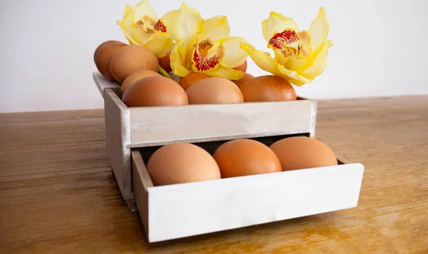 Fresh eggs in a box. Organic chicken eggs.