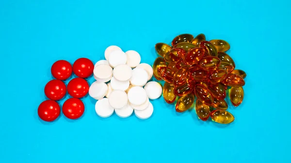 Surtido Píldoras Tabletas Cápsulas Medicamentos Farmacéuticos Sobre Fondo Azul — Foto de Stock