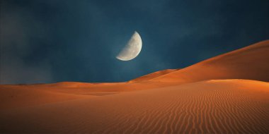 Ay ve çöl olan güzel bir manzara.