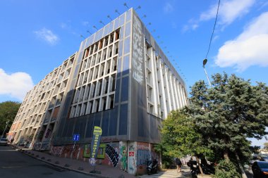 an abandoned building near the tree under the blue sky in istanbul