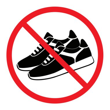İki siyah ve beyaz spor ayakkabısı üzerinde çapraz çizgisi olan çarpıcı kırmızı dairesel bir tabela ayakkabı ya da spor ayakkabısı olmadığını gösteriyor.