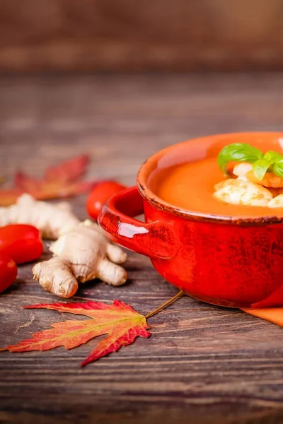 Homemade tomato soup with ginger, shrimps and basil on a brown wooden background. Copy space — Stock Image Homemade Tomato Soup Ginger Shrimps Basil Brown Wooden Background Copy Stock Photo