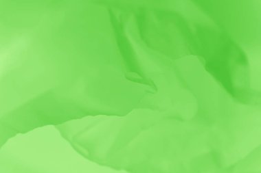 Hafif, narin, uçabilen, taze yeşil kumaş arka plan.