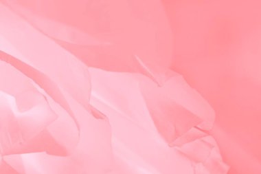 Pembe mercan rengi uçan saten doku, dalgalı kumaş, soyut bulanık arkaplan, değişken renk