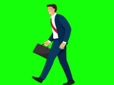 Sokakta yürüyen bir iş adamı.