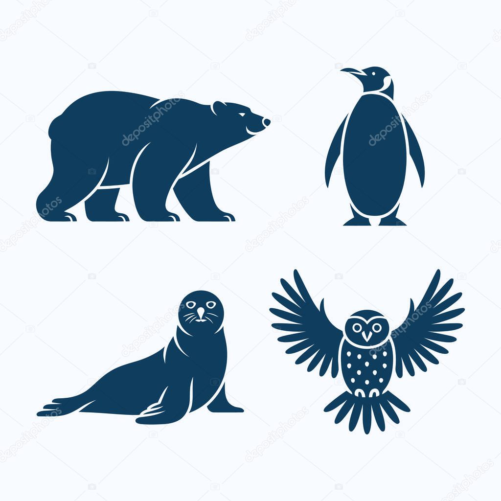 Set of polar bear, penguin standing upright, seal, and snow owl silhouettes. Vector illustration.