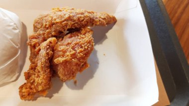 Fried chicken dish served on a white plate