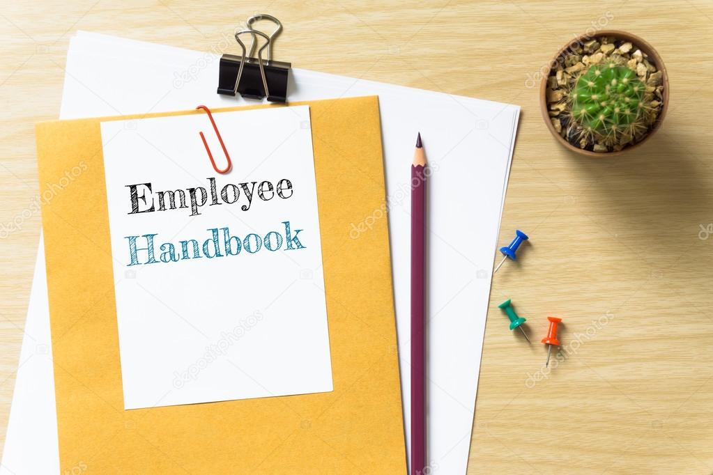 Employee handbook, message on the white paper.