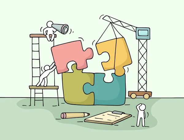 working little people with puzzle
