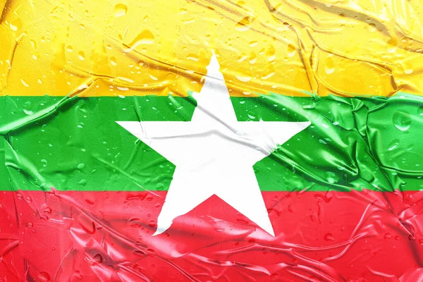 Soyut etki için su damlacıklarıyla desenli sarı, yeşil, kırmızı ve beyaz desenli..