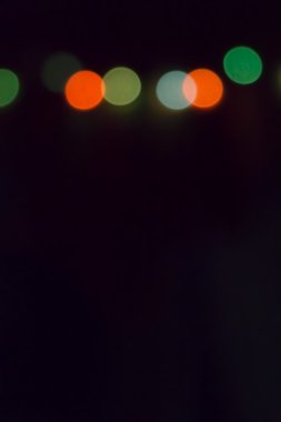 renkli bokeh. Siyah arka plan ile renkli noktalar.