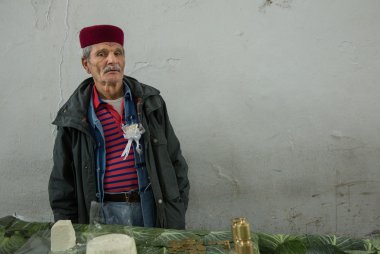  cheese salesman in Madina de Tunis  clipart