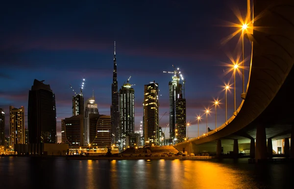 Skyline of Dubai from under a bridge — Stock Photo, Image