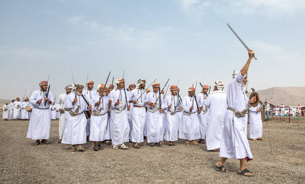 khadal, Oman,28th April 2018: omani men in traditional clothing, watchin a horse race